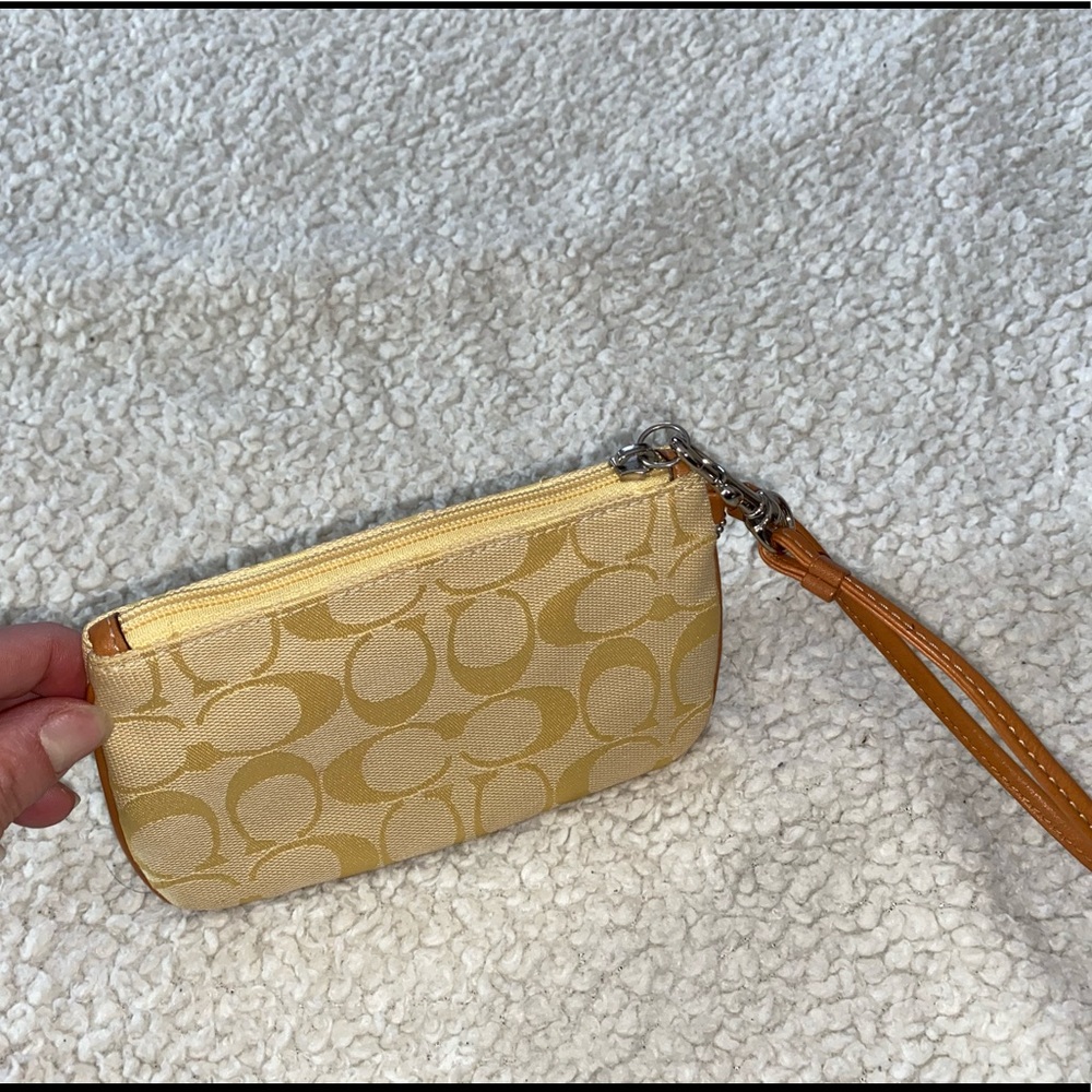 Yellow coach wristlet